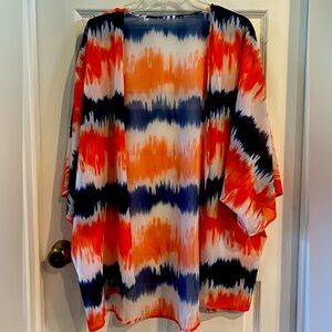 Bright cover up perfect for summer as a swimsuit covering piece!